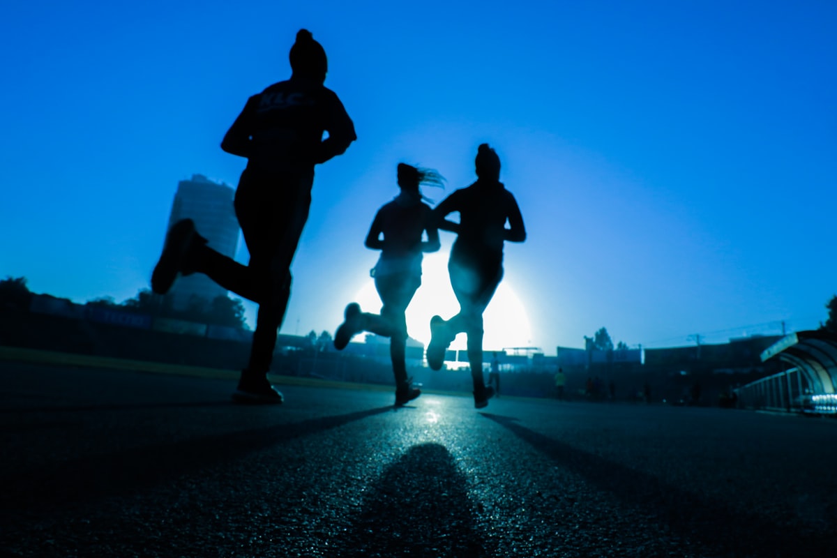 Woman drinking water during a workout break